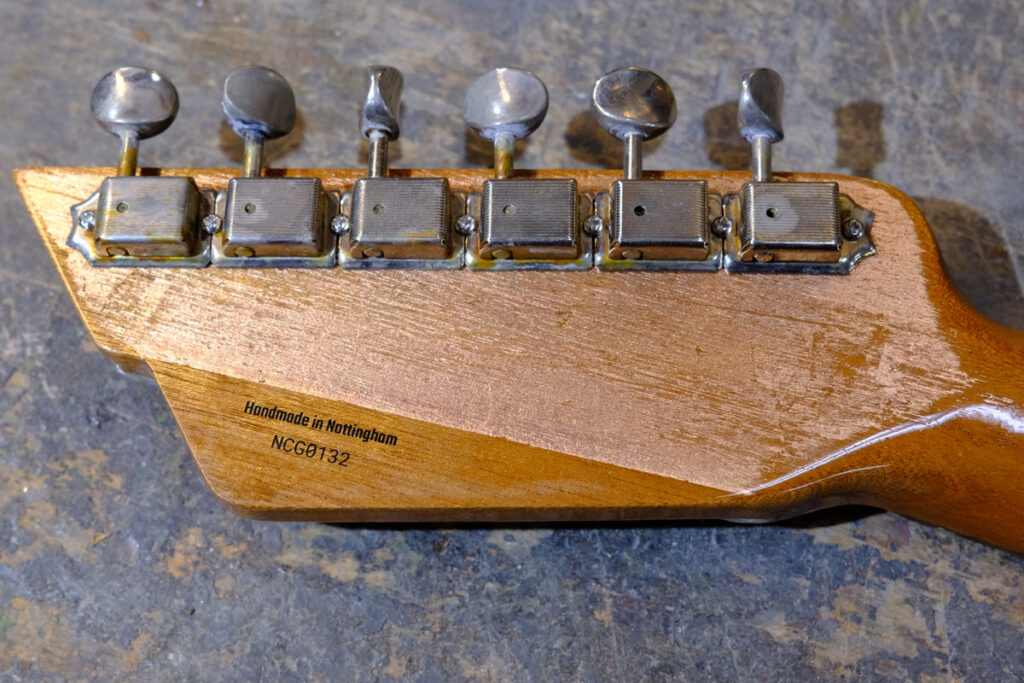 NCG Bayou - Distressed copper leaf over mahogany