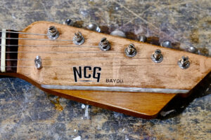 NCG Bayou - Distressed copper leaf over mahogany