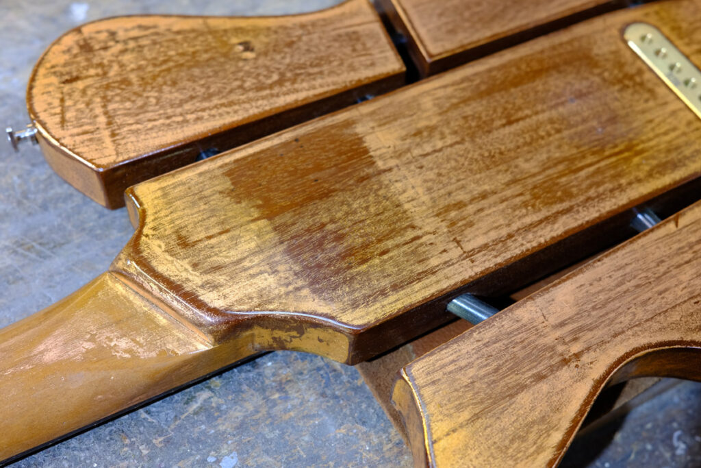 NCG Bayou - Distressed copper leaf over mahogany